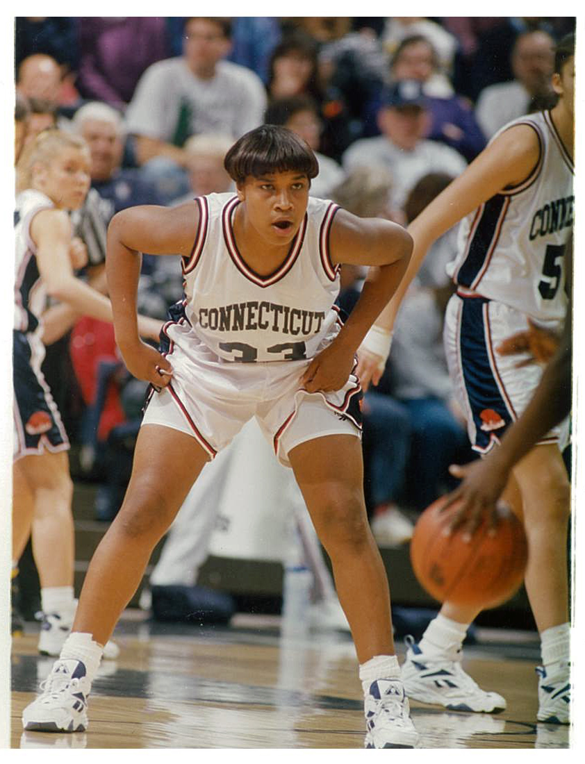 Jamelle Elliott in Connecticut #33 jersey on the court