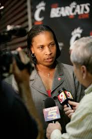 Jamelle Elliott being interviewed at a University of Cincinnati press conference.