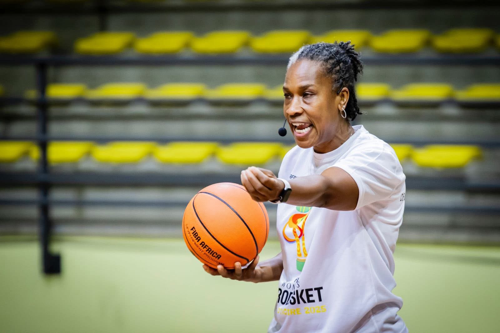 Jamelle Elliott coaching with a basketball at FIBA Africa clinic