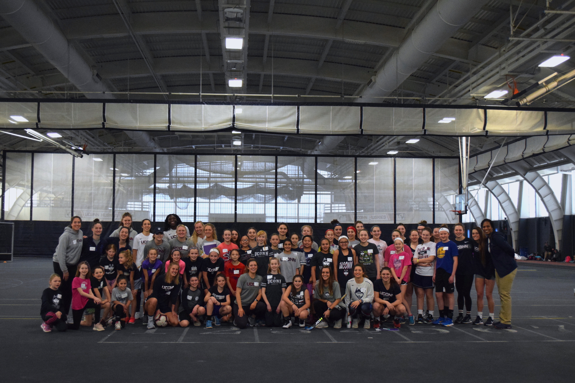 National Women and Girls in Sports Day Clinic group photo at UConn