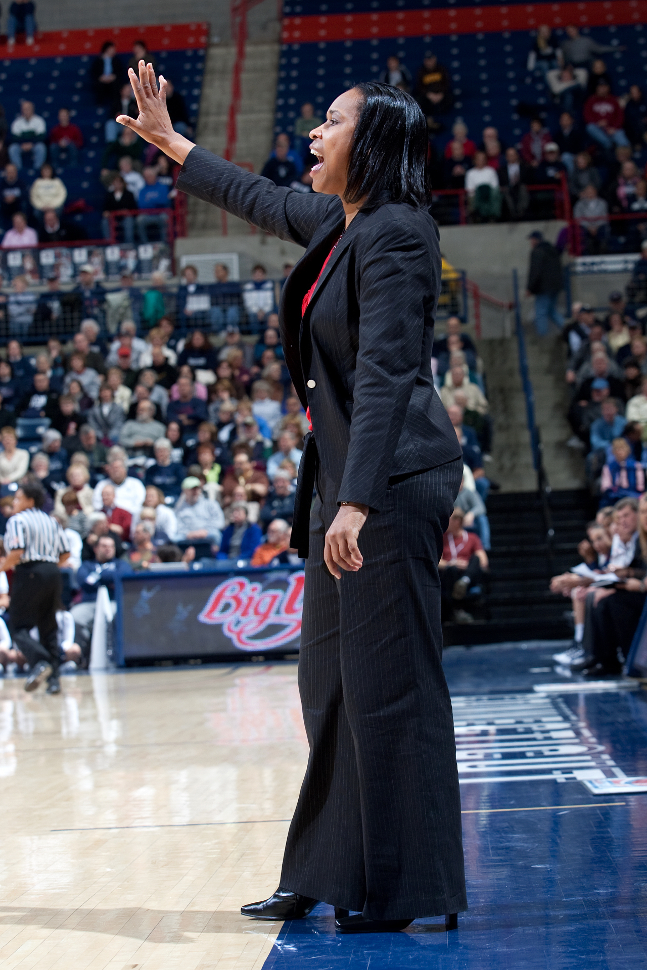 Jamelle Elliott coaching from the sideline against UConn